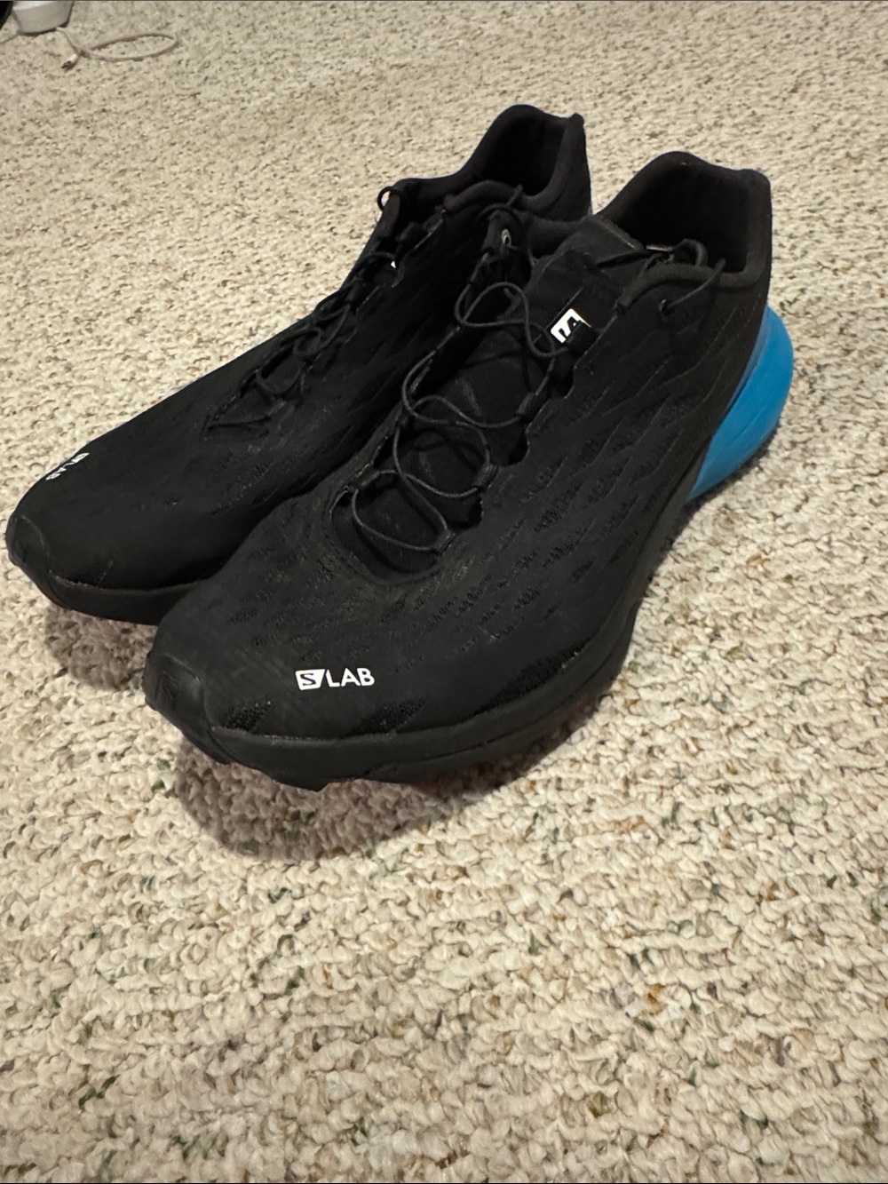 Salomon Black Athletic Shoes with Blue Heel